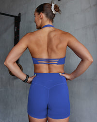 Woman wearing Abs Agile Halter Sports Bra - Power Cobalt | Model:Abbey | Size:S