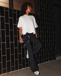 Woman wearing AfterDark ZeroCrease Cropped Tee - White | Model:Tomi | Size:S