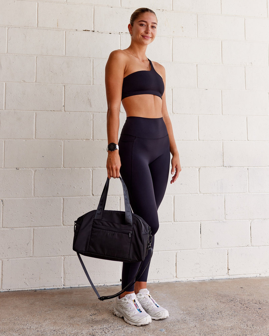 Woman wearing Angle Sports Bra - Black | Model:Asia | Size:S