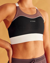 Woman wearing Elevated Accelerate Sports Bra - Black-Multi | Model:Charlize | Size:S | Thumbnail Index: 5