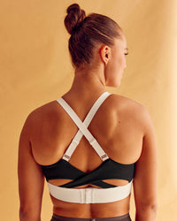 Woman wearing Elevated Accelerate Sports Bra - Black-Multi | Model:Charlize | Size:S