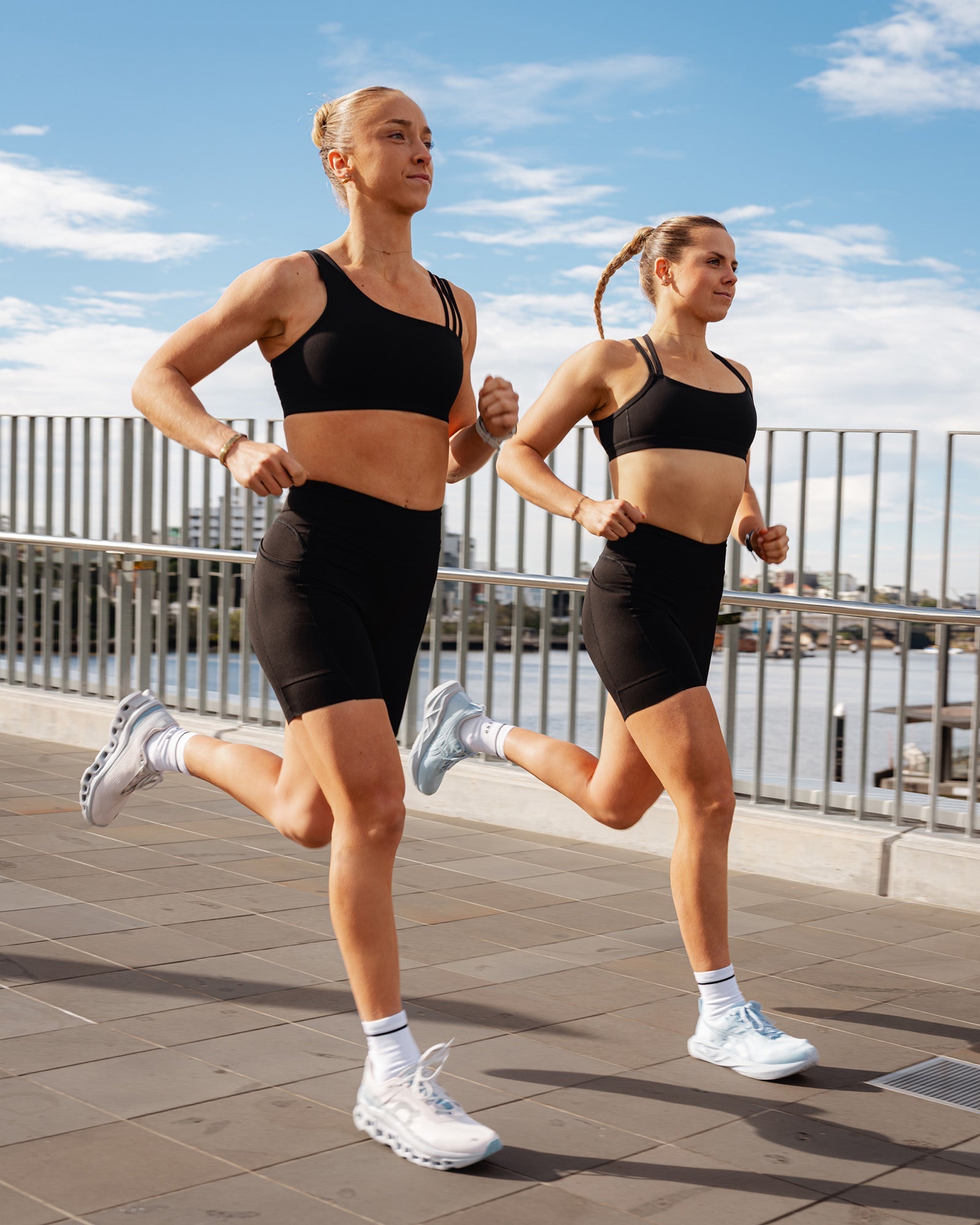 Duo wearing Elite Run High-Rise 7" Short Pockets - Black | Model:Both | Size:S