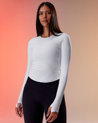Woman wearing Embrace Thermal Long Sleeve Tee - White | Model:Riley | Size:S