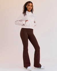 Woman wearing Woman wearing Fusion V-Contour High-Rise Flared Legging Pockets - Hot Chocolate | Model:Jordan | Size:S