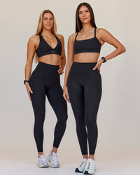 Woman wearing Fusion V-Contour Ultra High-Rise Full Length Legging Pockets - Black | Model:Both | Size:S