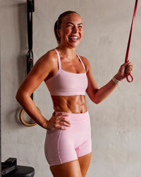 Woman wearing Momentum Sports Bra - Marshmallow | Model:Roisin | Size:S