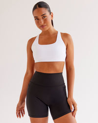 Woman wearing O.G Fusion Ultra High-Rise 6" Short Pockets - Black | Model:Ysabella | Size:S