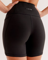 Woman wearing O.G Fusion Ultra High-Rise 6" Short Pockets - Black | Model:Ysabella | Size:S