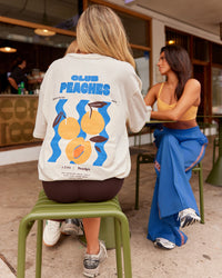 Woman wearing Peaches x LSKD Collection FLXCotton Oversize Tee - Off White | Model:Lizzy | Size:XS