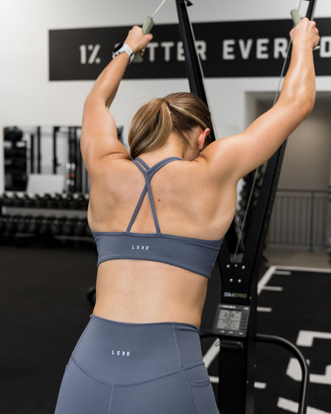 Woman wearing Stamina Pulse Sports Bra - Night Shadow | Model:Sarah | Size:S