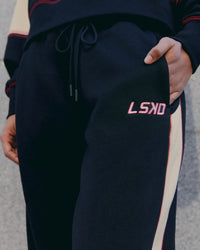 Woman wearing Stitch Up Fleece Sweat Pant - Black/Shale Beige | Model:Tomi | Size:S