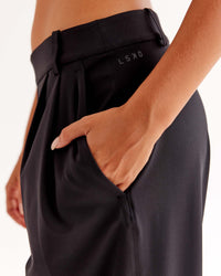 Woman wearing StretchShift Wide Leg Pant - Black | Model:Ruby | Size:S
