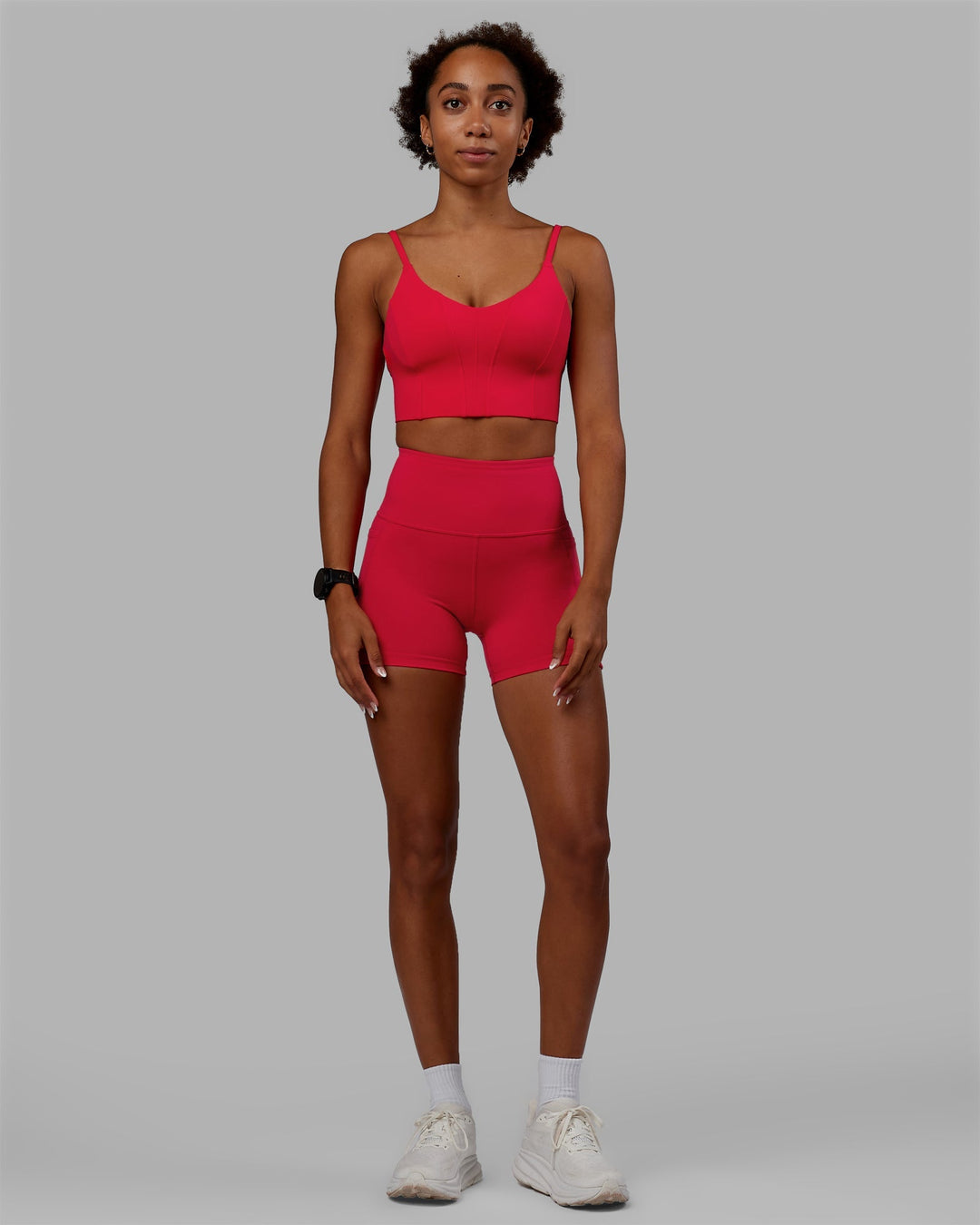 Woman wearing Flux Ultra High-Rise 4" Short Pockets - Scarlet