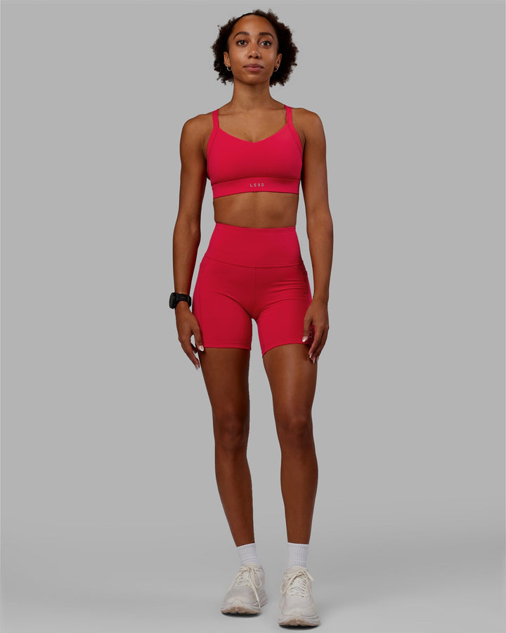 Woman wearing Interval Sports Bra - Scarlet