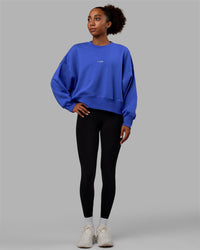 Woman wearing MVP Oversized Sweater - Power Cobalt