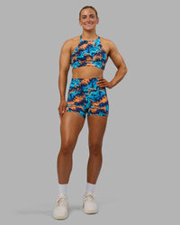 Woman wearing AMRAP High Neck Sports Bra - React Print | Model:Georgia | Size:S