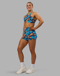 Woman wearing AMRAP High Neck Sports Bra - React Print | Model:Georgia | Size:S