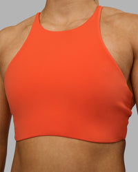 Woman wearing AMRAP High Neck Sports Bra - Ultra Orange | Model:Georgia | Size:S