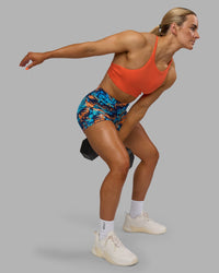 Woman wearing AMRAP High Neck Sports Bra - Ultra Orange | Model:Georgia | Size:S