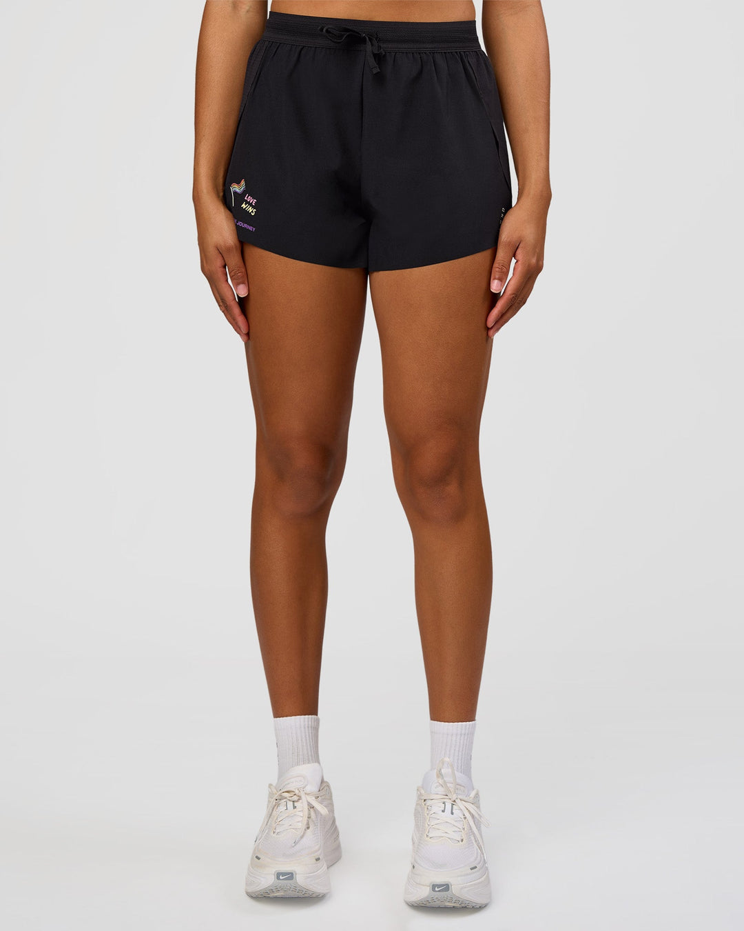 Woman wearing Accelerate 3" High-Rise Running Short - Black-Radiate | Model:Rosie | Size:S