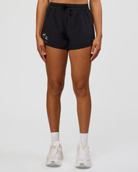 Woman wearing Accelerate 3" High-Rise Running Short - Black-Radiate | Model:Rosie | Size:S