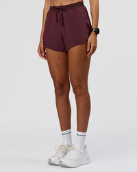 Woman wearing Accelerate 3" High-Rise Running Short - Cherry Lacquer | Model:Rhiley | Size:S | Thumbnail Index: 5