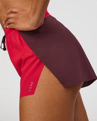 Woman wearing Accelerate 3" High-Rise Running Short - Cherry Lacquer-Scarlet | Model:Rosie | Size:S |