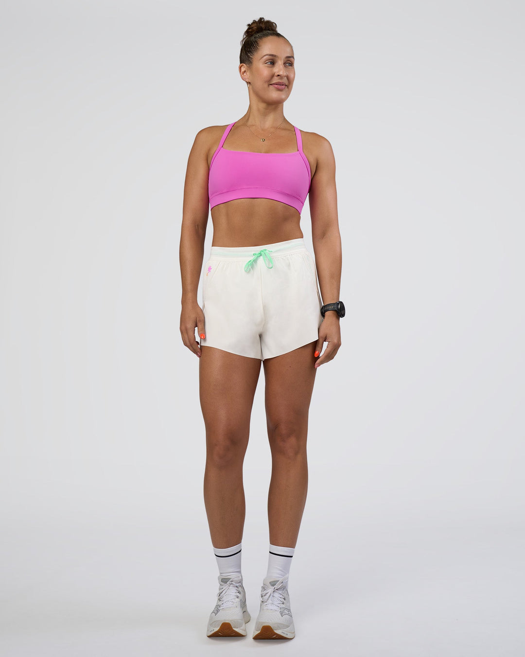 Woman wearing Accelerate 3" High-Rise Running Short - Off White-Floral Sticker | Model:Abbey | Size:S