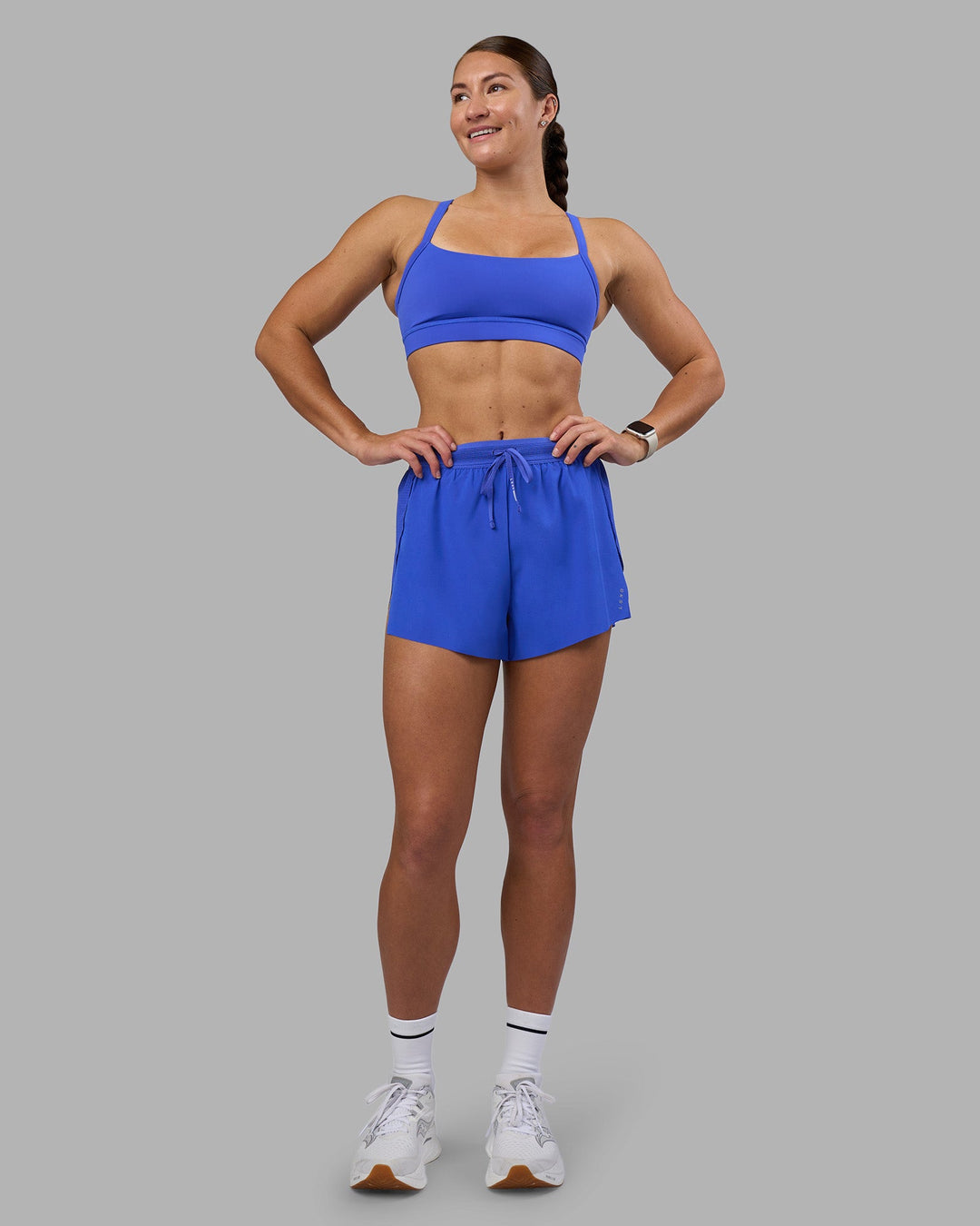 Woman wearing Accelerate 3&quot; High-Rise Running Short - Power Cobalt | Model:Hannah | Size:S