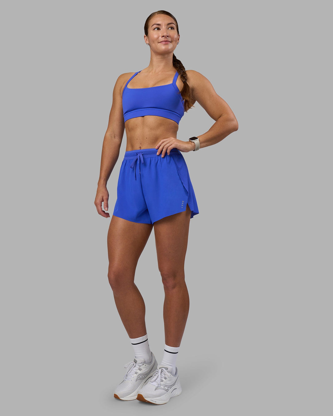 Woman wearing Accelerate 3&quot; High-Rise Running Short - Power Cobalt | Model:Hannah | Size:S