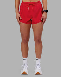 Woman wearing Accelerate 3" High-Rise Running Short - Scarlet | Set:true | Angle:front | Model:Keisha | Size:S
