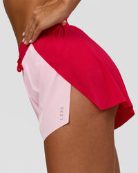 Woman wearing Accelerate 3" High-Rise Running Short - Scarlet-Marshmallow | Model:Amity | Size:S