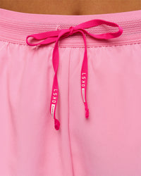 Woman wearing Accelerate 3" High-Rise Running Short - Ultra Pink-Candy Pink | Model:Bianca | Size:S