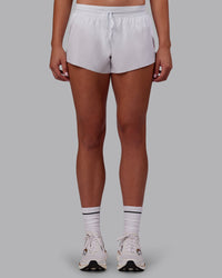 Woman wearing Accelerate 3" Running Short - White | Model:Charlize | Size:S