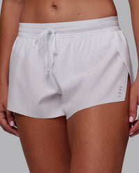 Woman wearing Accelerate 3" Running Short - White | Model:Charlize | Size:S