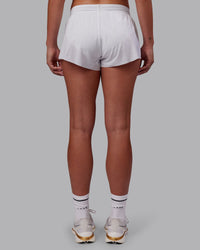Woman wearing Accelerate 3" Running Short - White | Model:Charlize | Size:S