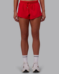 Woman wearing Accelerate Run Shorts - Scarlet | Model:Charlize | Size:S