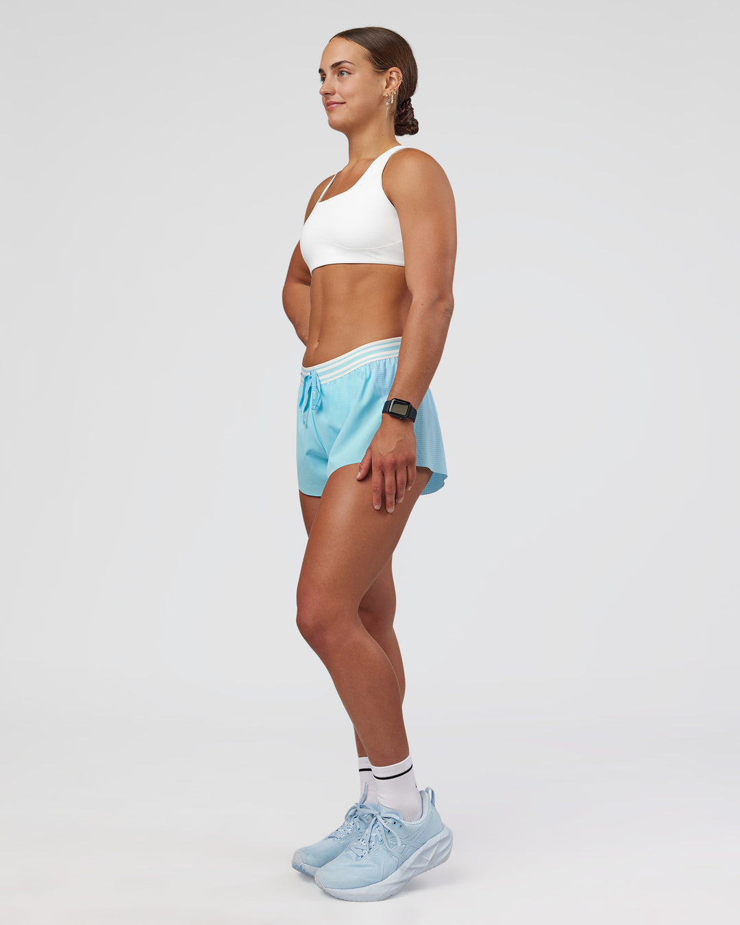 Woman wearing Accelerate 3" Mid-Rise Running Short - Baltic Sea-Off White | Model:Keisha | Size:S