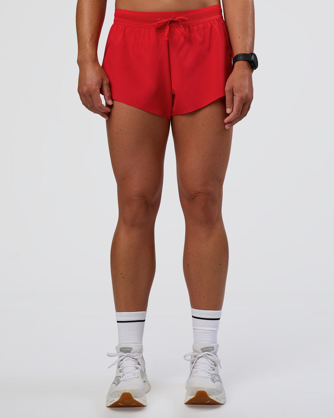 Woman wearing Accelerate 3" Mid-Rise Running Short - Flame | Set:true | Angle:front | Model:Sav | Size:S