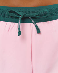 Woman wearing Accelerate 3" Mid-Rise Running Short - Transformative Teal-Marshmallow | Model:Amity | Size:S