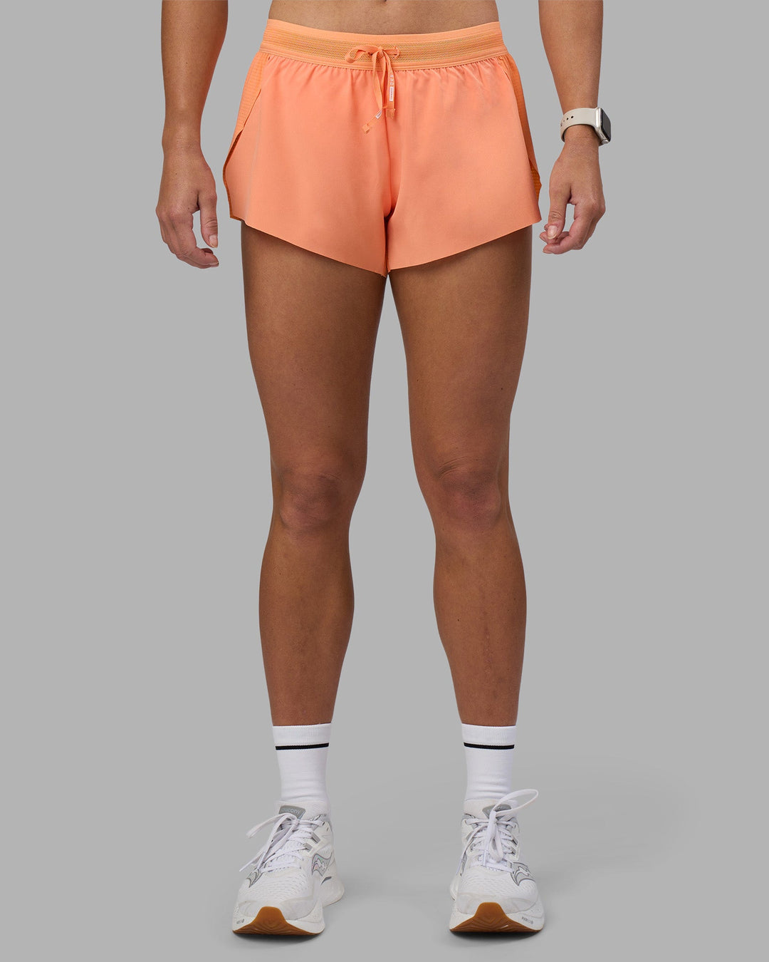 Woman wearing Accelerate 3&quot; Running Short - Cantaloupe | Model:Hannah | Size:S