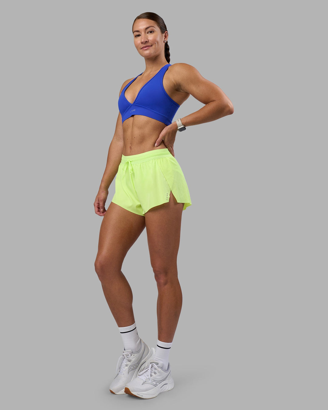 Woman wearing Accelerate 3&quot; Running Short - Lime Glo | Model:Hannah | Size:S