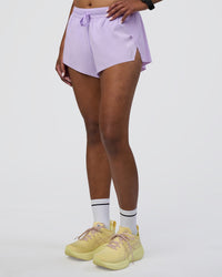 Woman wearing Accelerate 3" Running Short - Pale Lilac | Set:true | Angle:side | Model:Rica | Size:S