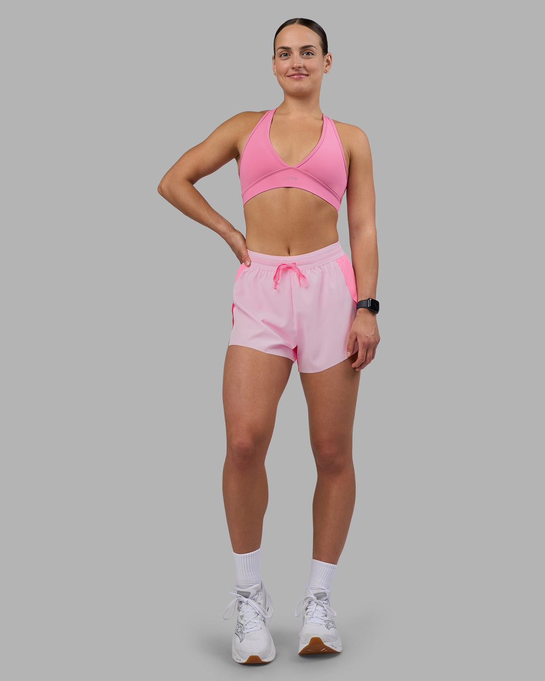 Woman wearing Accelerate 3" High-Rise Running Short - Candy Pink-Marshmallow | Model:Keisha | Size:S