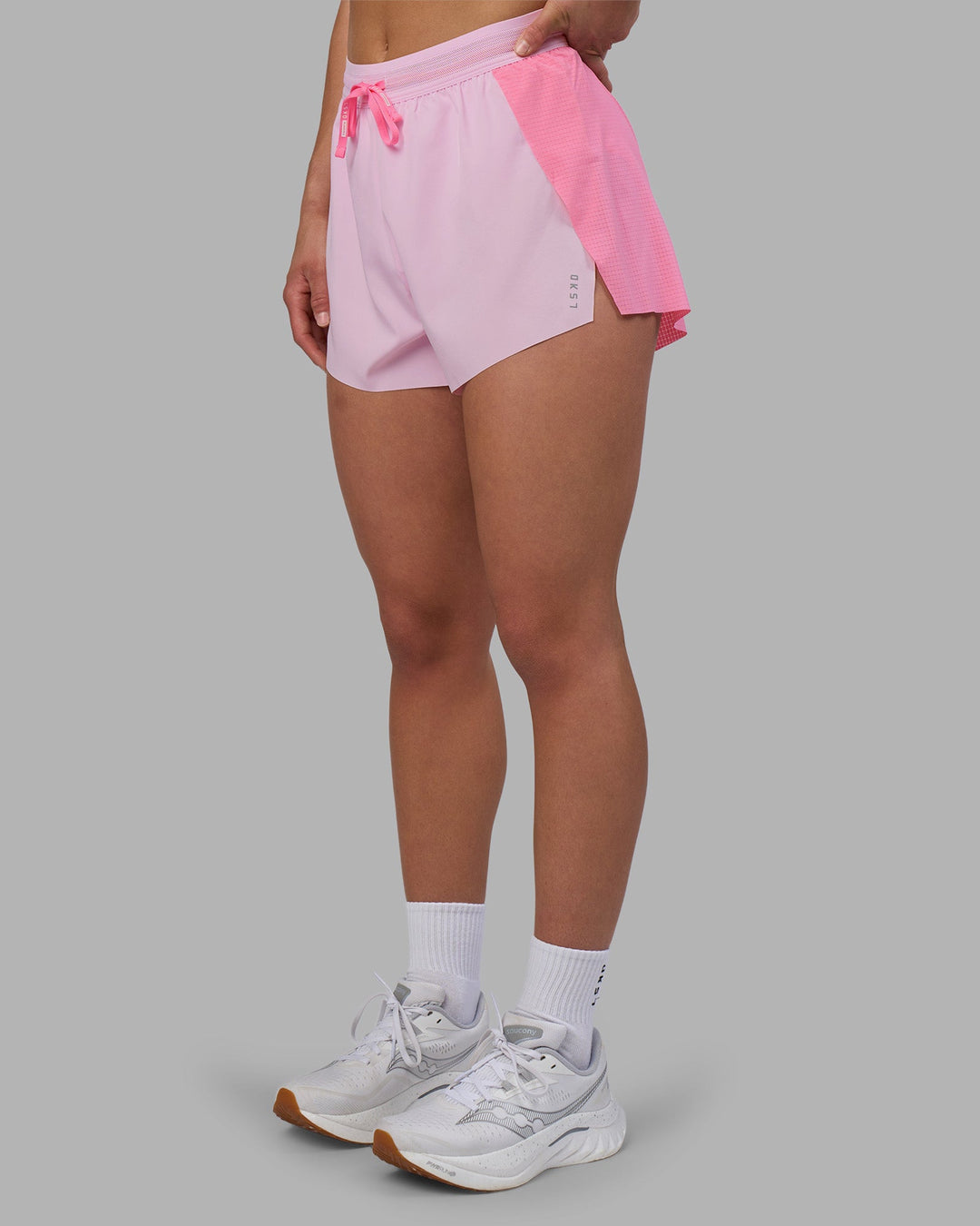 Woman wearing Accelerate 3" High-Rise Running Short - Candy Pink-Marshmallow | Model:Keisha | Size:S