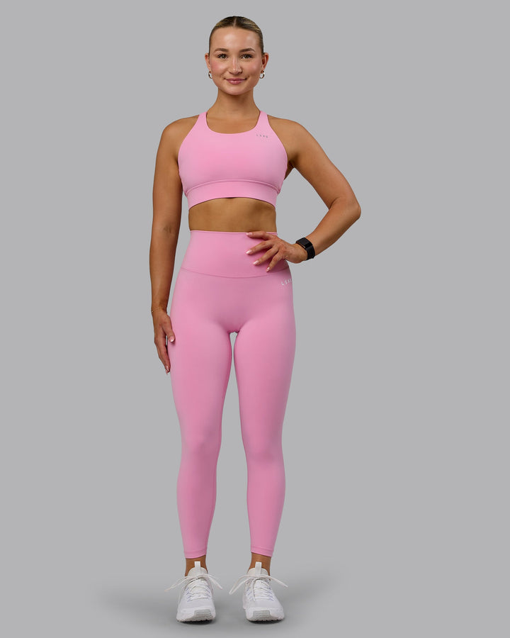 Woman wearing Accelerate Sports Bra - Bubblegum
