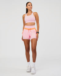 Woman wearing Accelerate Sports Bra - Marshmallow | Model:Rhiley | Size:S