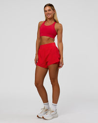 Woman wearing Accelerate Sports Bra - Scarlet | Model:Amity | Size:S