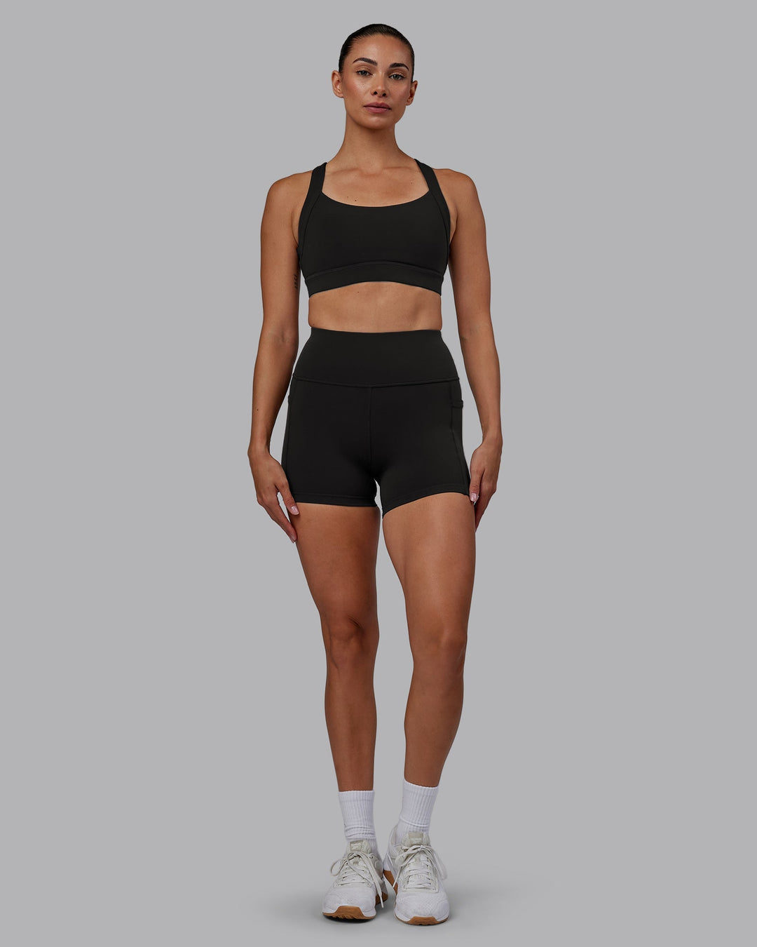 Woman wearing Advance Sports Bra - Pirate Black