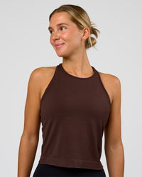 Woman wearing AeroFLX+ Seamless Flow Skimmer Tank - Hot Chocolate/Hot Chocolate | Model:Amity | Size:S